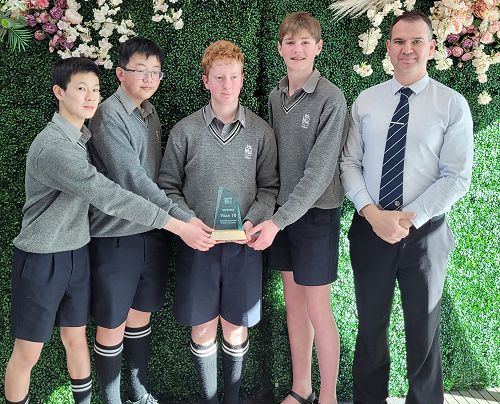 The winning Year 10 team with Mr Ducre