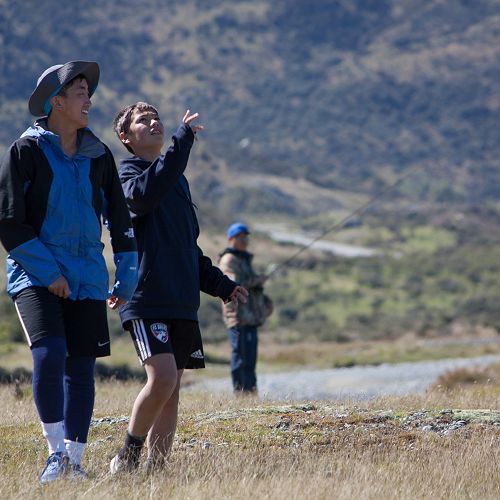 Ben Hall and En Watanabe find inspiration in the sky while Jin Kim fishes for dinner in the background.