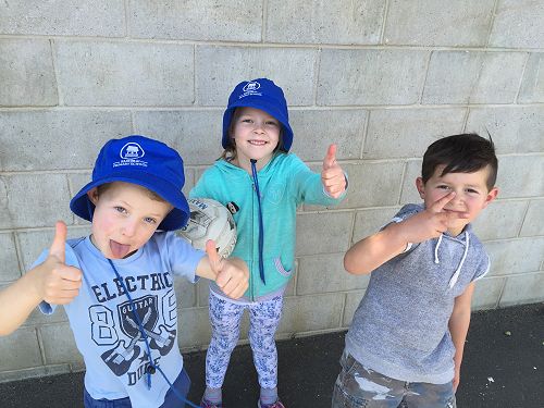 Mason, Charlotte and Manu pose for the camera