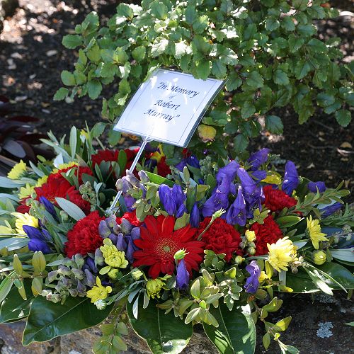 A wreath is laid at Robert Murray's memorial garden.&nbsp;