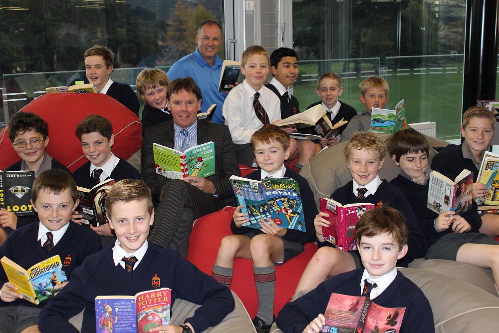 Principal Neil Garry taking part in Go McGlashan Read with Mr Hore's Year 7 class.