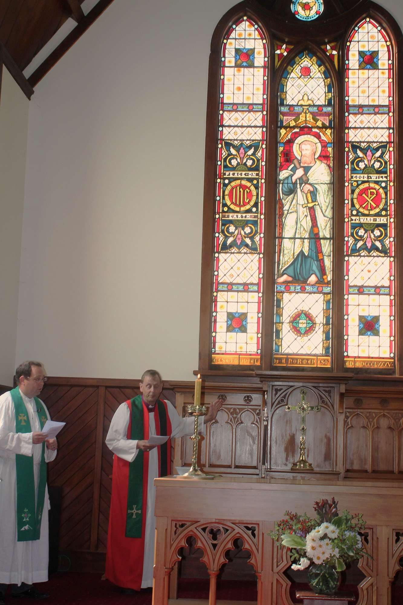 Stained-glass window rededication service