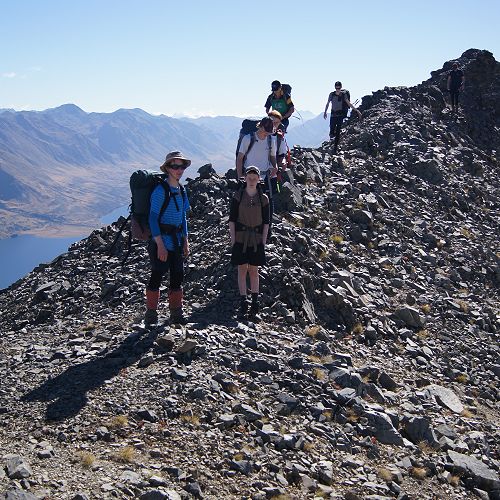 Clambering over the final 'false summit' before the top of Mt Campbell