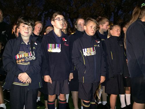 Medals are proudly worn.