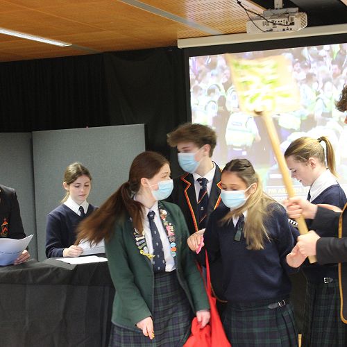 Caught in the middle - the young students.