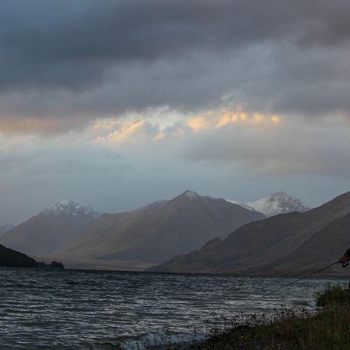 Mr Brown fishing as the rain clears
