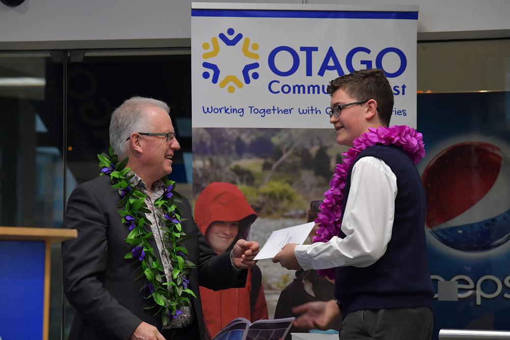 Danny Adams (Y10) receiving his Otago Polytechnic Pacific Island Recognition Award from Chris Morland.