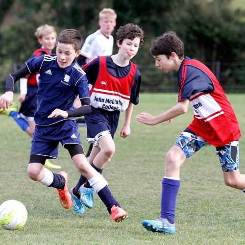 Julian Hamilton attempts to shut down the player in the Waihi Exchange Football Game.&nbsp;