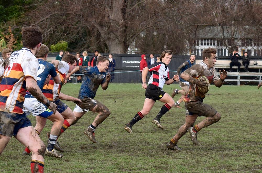 First XV captain and deputy head boy Rory Ferguson bolts for his 4th try
