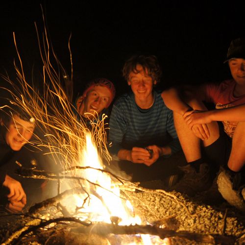 Nic, Riley, Sam and Jack relaxing by the campfire