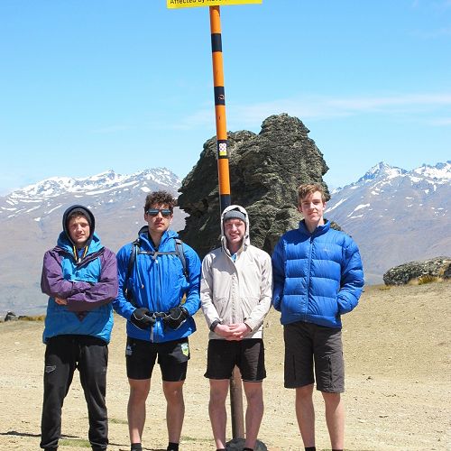 Feeling the burn at the top of Duffers Saddle
          Road Left to right: Jimmy McEwan (support crew), Seamus Leahy,
          Christian Tucker, Michael Sewell