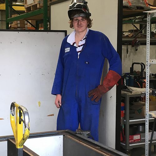 Harry Russell takes a break from welding on Gateway