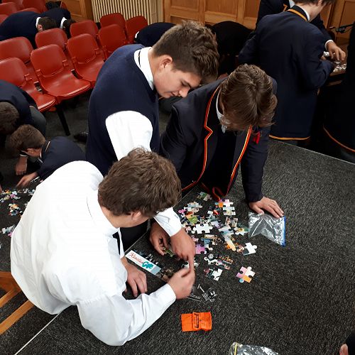 Boys doing a group work activity at the workshop.