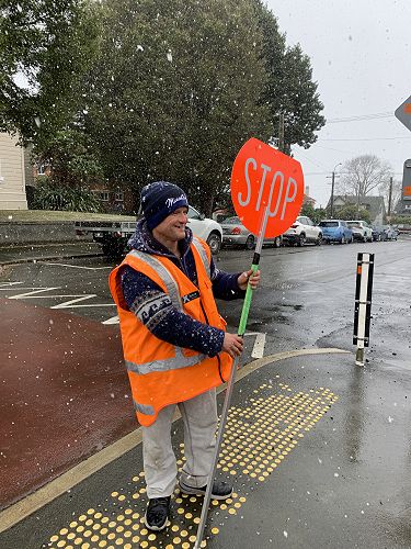 Thanks Donovan for getting our tamariki safely across the road regardless of the weather!