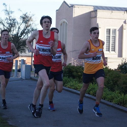 The lead group of the tightly-contested senior cross country