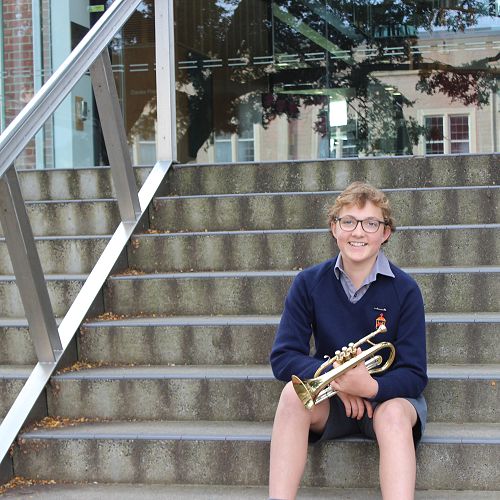 Cornet player Ruan Hannam outside the Edgar Learning Centre