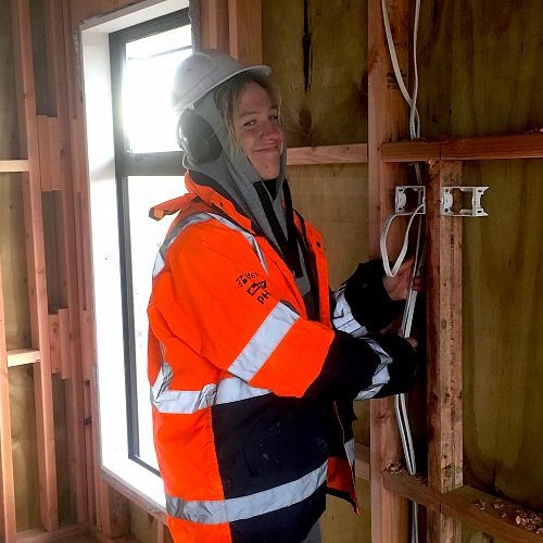 Nathan Wolf wiring up a new house in a Mosgiel Subdivision