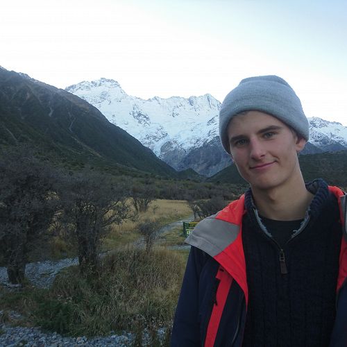 Callum White posing on the Kea Track up to the Mueller Glacier