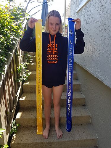 Olivia McBride with her ribbons