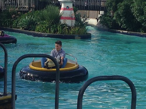 Spencer's having fun in the Bumper Boats at Rainbows End.