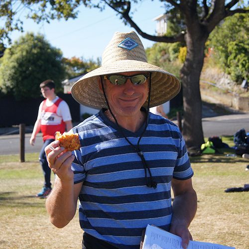 Sun-smart and enjoying a favourite hobby (eating).