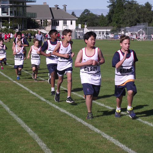 Junior members of Gilray house compete in the 400m trials