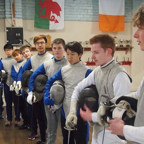 The McGlashan fencers suited up with weapons, masks and lam&eacute;s.
