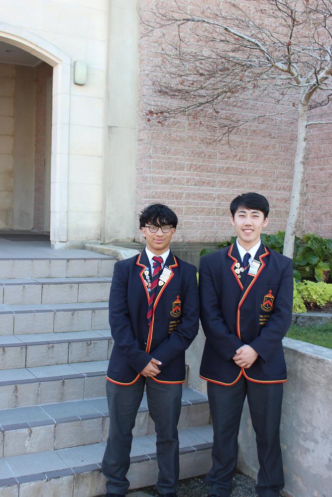 Arts prefects Emilio Ghosh-Novero and David Song outside the John McGlashan chapel.