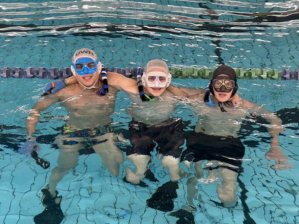 Underwater Hockey Players Over The Moon!