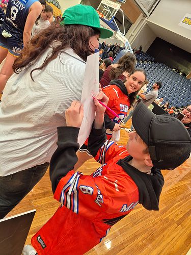 Signing autographs!