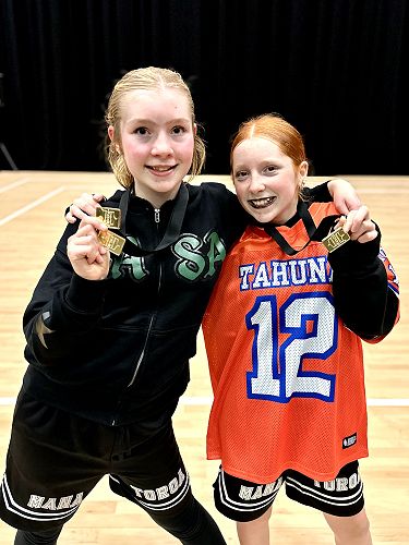 Ellie and Olive with their Gold Medals