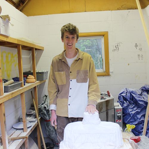 Year 12 sculpture student James Lawson alongside his work in progress!