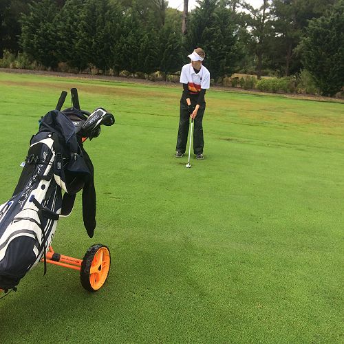 Callum White prepares to play a shot on the fairway at Clearwater.