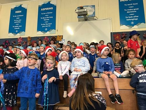 The whole Junior School singing Christmas songs at our concert.