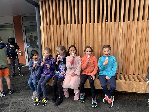 Rūma tekau ma rua enjoy their ice creams to celebrate the opening of the  new space